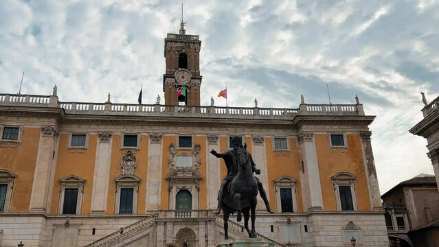 Slow motion: Famous statue of Marcus Aurelius and Capitoline Hill in backdrop