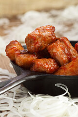 Fried chicken in a pan, Ukrainian cuisine. Photo of food on a white background