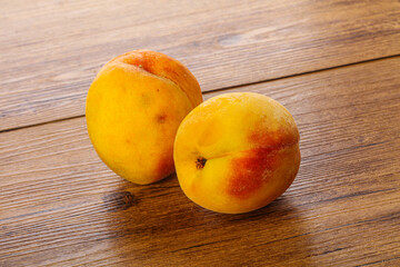 Fototapeta na wymiar Two Sweet ripe tasty peaches
