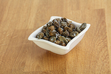 Salted marinated capers snack appetiser