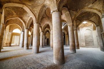 Fototapeta premium Ancient columns of hypostyle hall inside Jameh Mosque of Isfahan