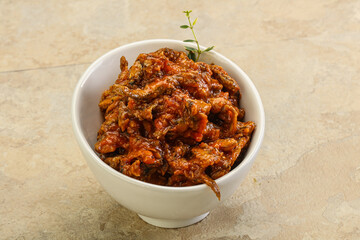 Canned anchovy in tomato sauce