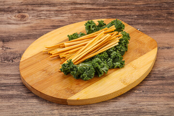 Chechel cheese sticks over board