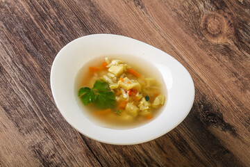 Tasty chicken soup with carrot
