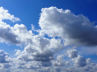 Naklejka na ściany i meble beautiful clouds in blue sunny sky