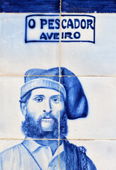 detail on a panel of azulejos tiles on the facade of old railways station in Aveiro, Portugal