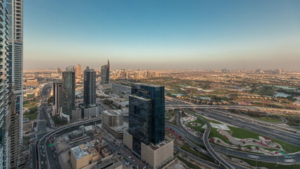 Panorama showing Dubai marina and JLT skyscrapers along Sheikh Zayed Road aerial timelapse.