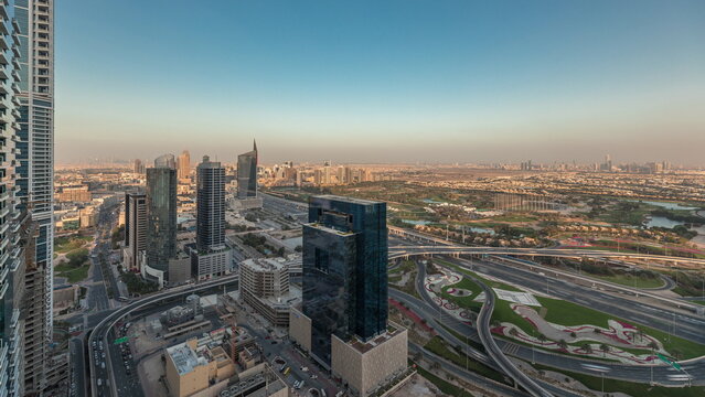 Panorama showing Dubai marina and JLT skyscrapers along Sheikh Zayed Road aerial timelapse.