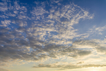 Evening sky with little clouds, a clear sunset.