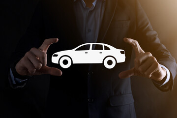 Digital composite of Man holding car icon.Car automobile insurance and car services concept. Businessman with offering gesture and icon of car