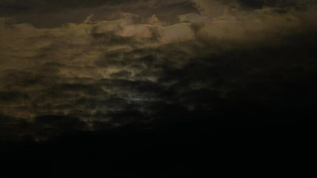 4K Timelapse view of a dark cloudy sky just before sunset - dramatic view