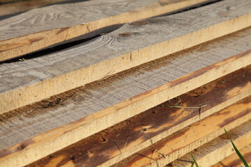 New fresh boards. Procurement of building materials.