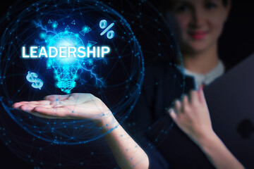 Business, Technology, Internet and network concept. Young businessman working on a virtual screen of the future and sees the inscription: Leadership