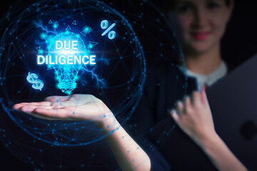 Business, Technology, Internet and network concept. Young businessman working on a virtual screen of the future and sees the inscription: Due diligence
