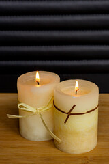 Fototapeta na wymiar Two candle whith beautiful background