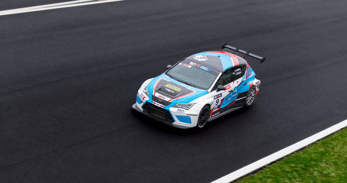 Car racing on racetrack high angle view, Cupra TCR touring