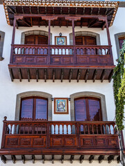 Teror at Gran Canaria, Spain. A beautiful traditional town with colorful houses with wooden...