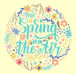Spring is in the air. Badge typography element. Lettering spring season for greeting card, invitation template. Composition with spring flowers. Vector illustration. Hand lettered inspirational quote