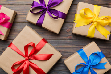 Collection of Holiday present boxes on a colored background. top view close up