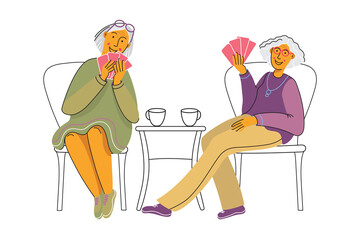 Older women playing in card games. Elderly friends spend time together