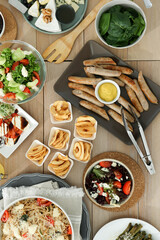 Brunch table setting with different delicious food, flat lay