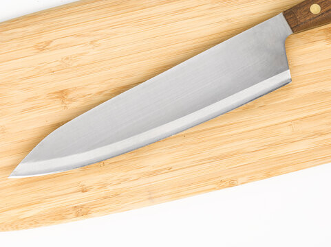 Cuchillo De Cocina Profesional Sobre Tabla De Corte De Madera