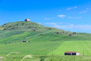 Fototapeta na wymiar Basilicata landscape: the Norman castle of Monteserico. Near town of Genzano di Lucania, it is for the construction phases that characterize it, an example of medieval architecture in Italy.