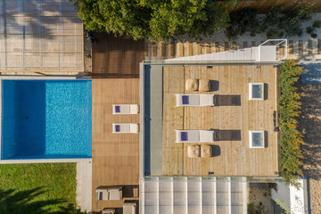 Modern villa with pool and deck with interior