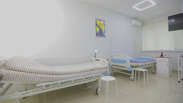 Hospital ward interior. New modern room in the hospital. Bright new ward in a modern clinic
