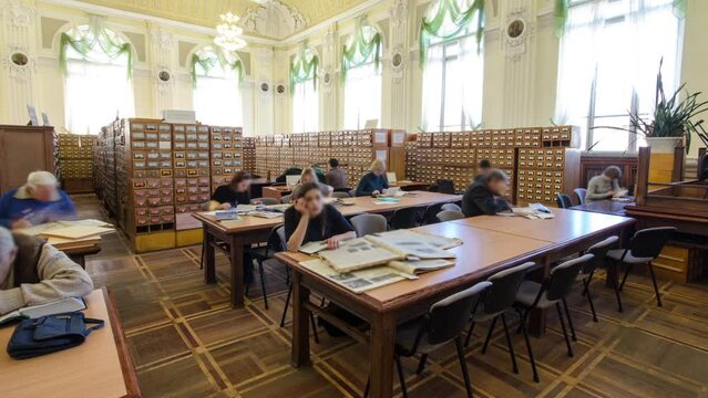 People studying in the reading room of national library timelapse