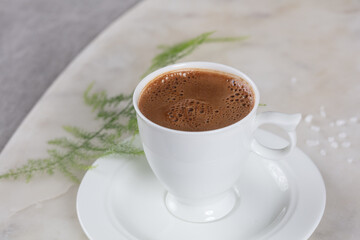 Turkish coffee served in classic Turkish coffee cup