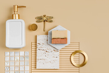 Bathroom or kitchen decoration materials on beige background. Marble slab, ceramic tiles, natural...