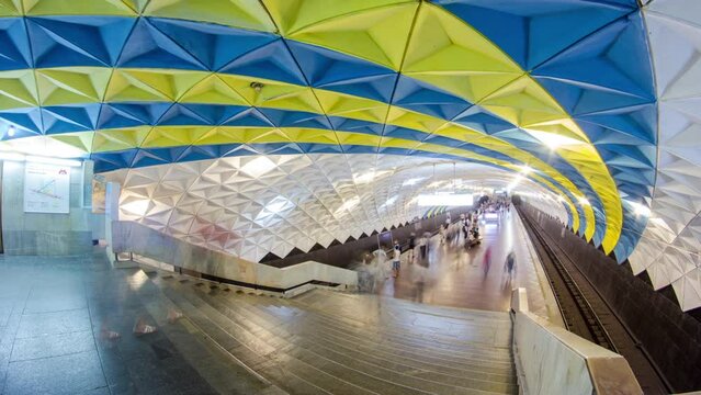 An underground train departing from Sportivna metro station on Kholodnogorska Line of Kharkiv metro timelapse hyperlapse