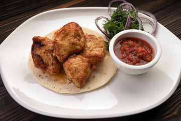 Turkey shish kebab with sauce