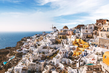 Panoramic view from Oia village with Windmill on Santorini island, Greece