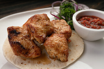 Turkey shish kebab with sauce