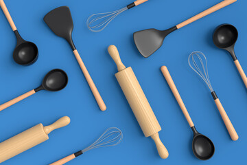 Wooden kitchen utensils, tools and equipment on blue background.