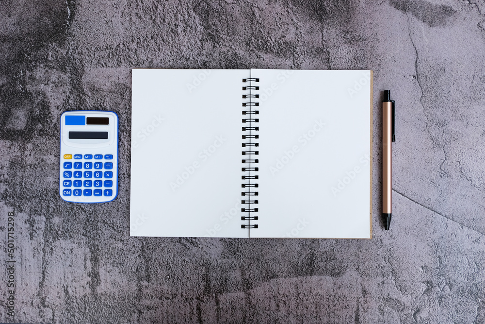 Poster notebook and pen on the table