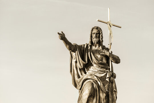 St. John The Baptist Statue On Charles Bridge. Prague, Czech Republic