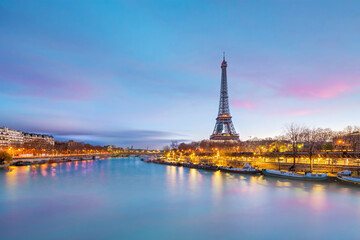 Naklejka na ściany i meble The Eiffel Tower and river Seine at twilight in Paris