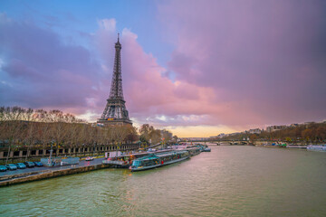 Fototapeta na wymiar The Eiffel Tower and river Seine at twilight in Paris