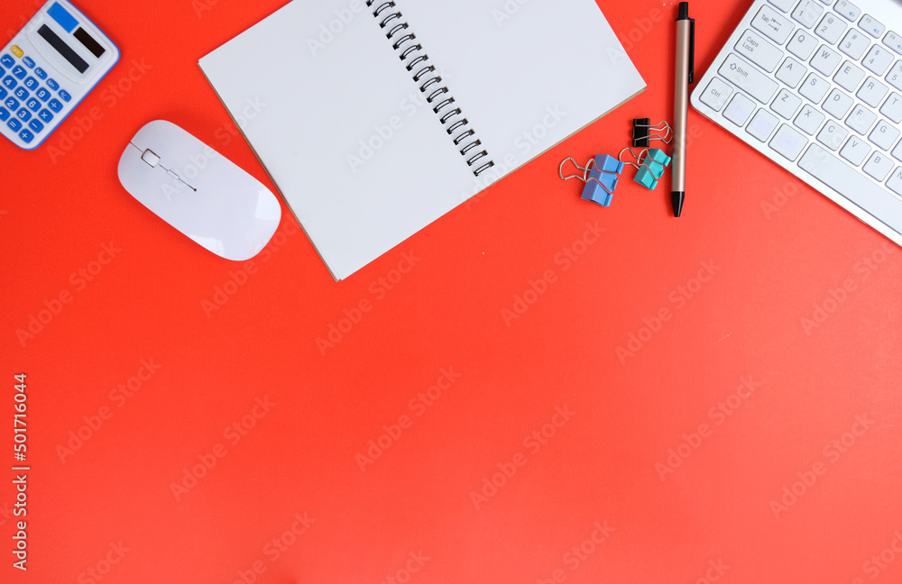 Poster office desk with computer keyboard, pen, eyeglasses, and notebook top view with copy space of a cup 