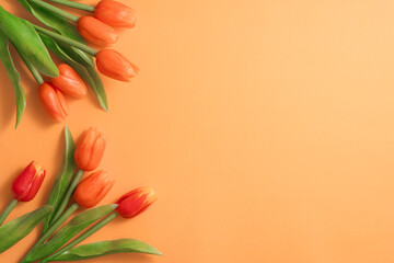 Mother's day background concept. Top view design of holiday greeting tulip flower bouquet on bright...