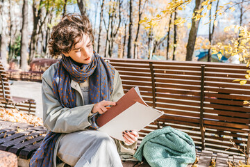 Lonely in autumn park to study or read