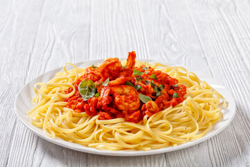 Shrimp alla Marinara with pasta on plate