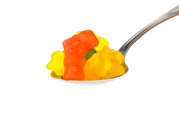 jelly bears in spoon isolated on white