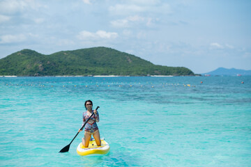 woman surfing in the sea