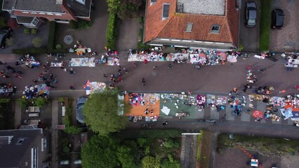 Netherlands - 27 april 2022, Blaricum: Flea market on Kingsday, Aerial topdown view