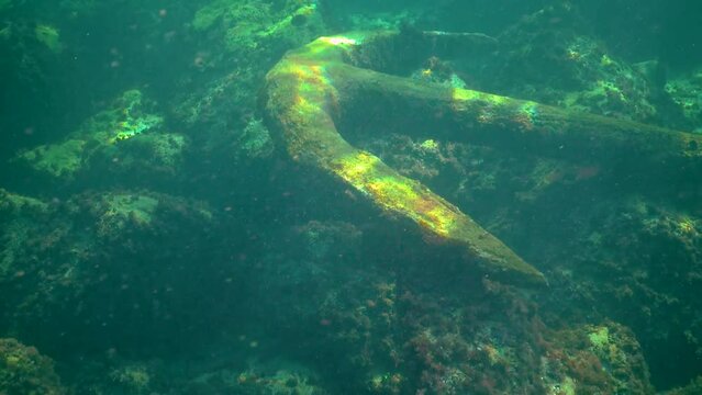 Ancient two-legged anchor on the seabed in the Black Sea