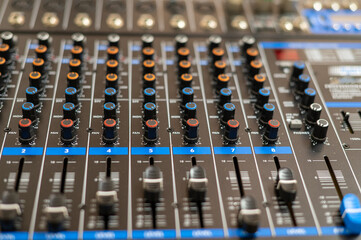 Close up shot with selective focus of mixing desk